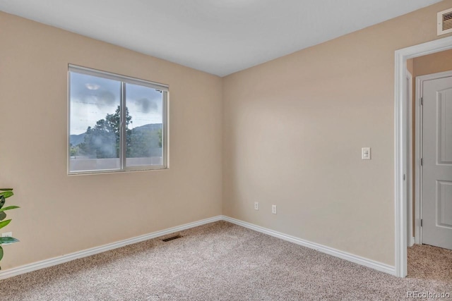 861 Circle Rd, Palmer Lake, CO 80133 - unfurnished room with baseboards, carpet, and visible vents