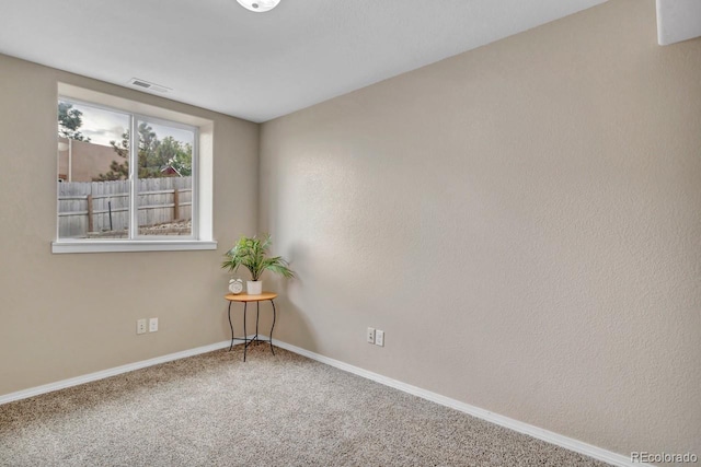 861 Circle Rd, Palmer Lake, CO 80133 - spare room with baseboards, carpet floors, and visible vents