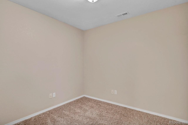 861 Circle Rd, Palmer Lake, CO 80133 - unfurnished room featuring baseboards, visible vents, and carpet