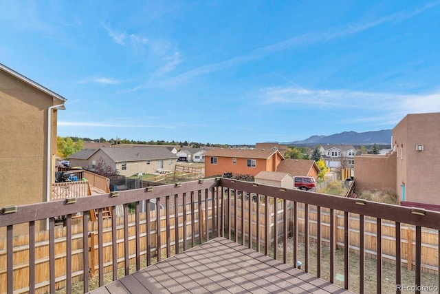 861 Circle Rd, Palmer Lake, CO 80133 - wooden terrace with a residential view, fence, and a mountain view