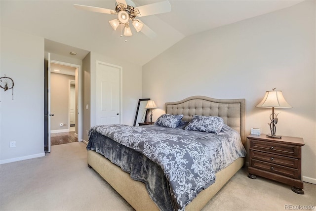 bedroom featuring light colored carpet, ceiling fan, and vaulted ceiling