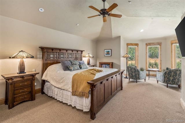 309 Eastridge Dr, Dillon, CO 80435 - bedroom with light colored carpet, recessed lighting, vaulted ceiling, and ceiling fan