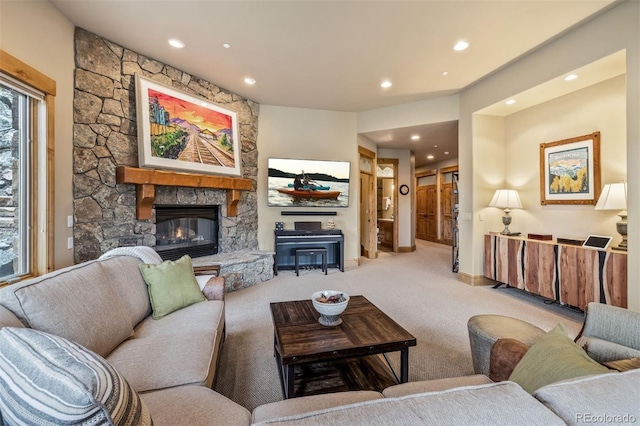 309 Eastridge Dr, Dillon, CO 80435 - carpeted living area featuring recessed lighting and a stone fireplace