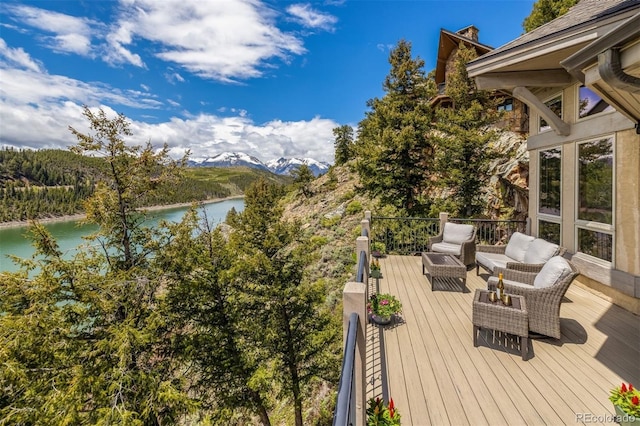 309 Eastridge Dr, Dillon, CO 80435 - deck with a water and mountain view and an outdoor hangout area