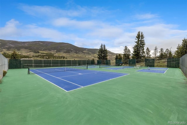 309 Eastridge Dr, Dillon, CO 80435 - view of tennis court featuring a mountain view