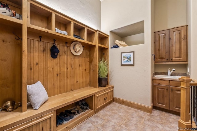 309 Eastridge Dr, Dillon, CO 80435 - mudroom with a sink and light tile patterned floors