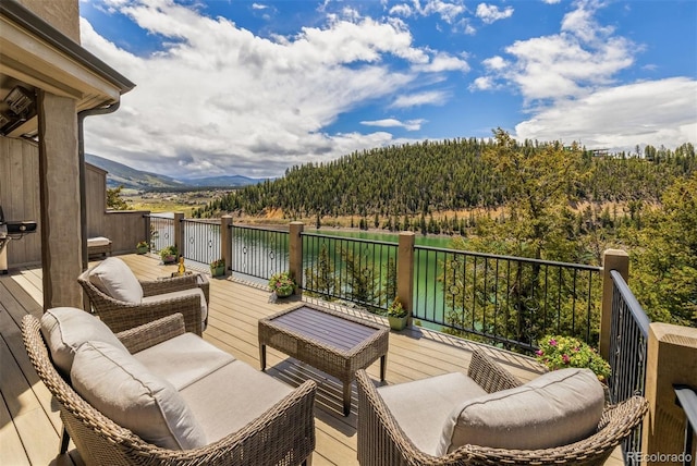 309 Eastridge Dr, Dillon, CO 80435 - wooden terrace featuring outdoor lounge area
