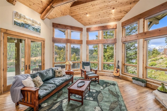 309 Eastridge Dr, Dillon, CO 80435 - sunroom / solarium with french doors, a wooden ceiling with exposed beams, hardwood / wood-style floors, plenty of natural light, and high vaulted ceiling