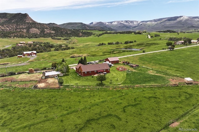 bird's eye view with a mountain view and a rural view