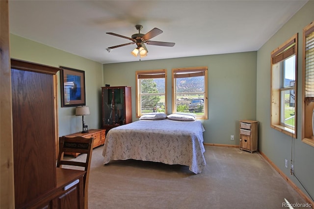 bedroom featuring carpet and ceiling fan