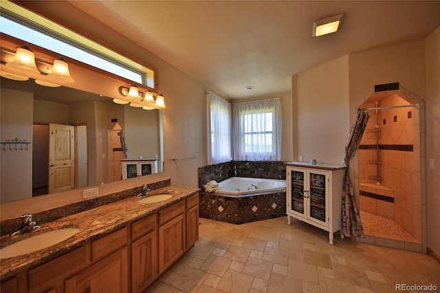 bathroom featuring independent shower and bath, double sink vanity, and tile floors