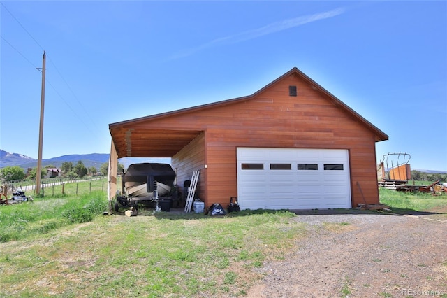 garage featuring a mountain view