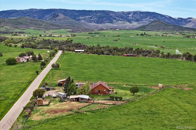 aerial view with a mountain view and a rural view