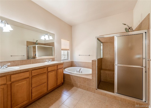 bathroom featuring vanity, tile patterned flooring, and separate shower and tub