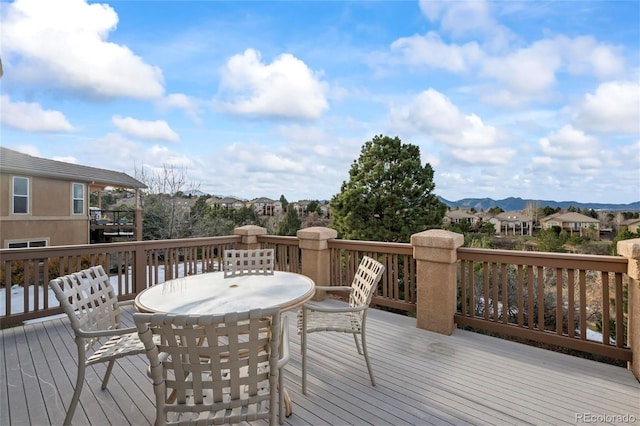 wooden terrace featuring a mountain view