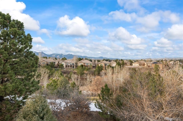 view of mountain feature with a water view