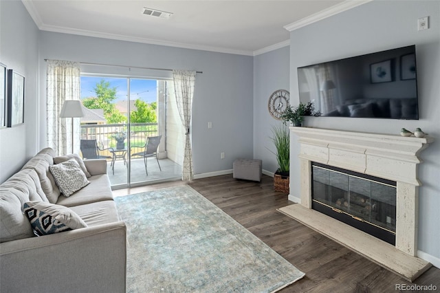 7422 S Quail Cir Unit 1624, Littleton, CO 80127 - living area featuring wood finished floors, ornamental molding, a premium fireplace, and baseboards