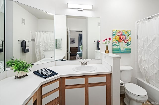 7422 S Quail Cir Unit 1624, Littleton, CO 80127 - ensuite bathroom featuring toilet, vanity, and shower / bath combination with curtain