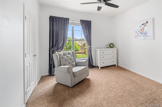 7422 S Quail Cir Unit 1624, Littleton, CO 80127 - sitting room with light carpet, ceiling fan, and baseboards