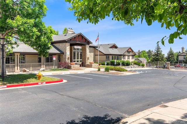 7422 S Quail Cir Unit 1624, Littleton, CO 80127 - view of property with uncovered parking