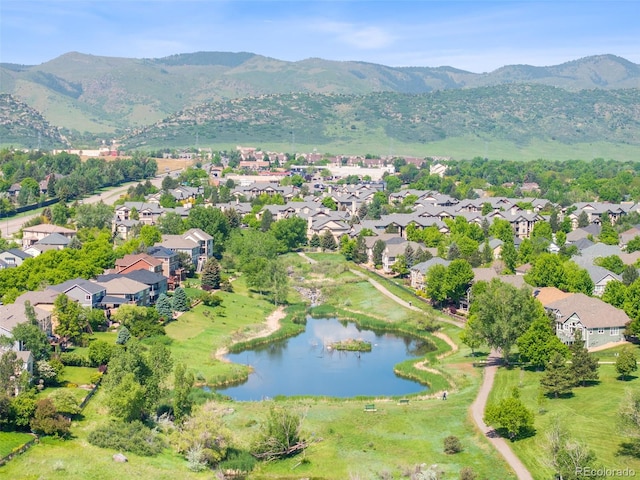 7422 S Quail Cir Unit 1624, Littleton, CO 80127 - aerial view of property's location with a water and mountain view and nearby suburban area
