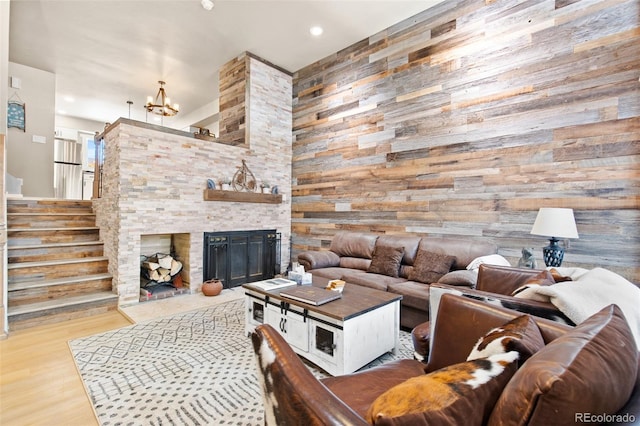 200 Primrose Path Unit 11, Breckenridge, CO 80424 - living area with wood walls, a chandelier, wood finished floors, stairs, and recessed lighting