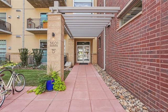 property entrance with a balcony