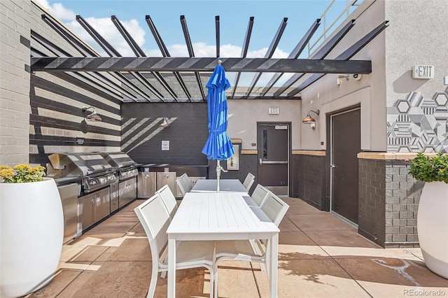 view of patio / terrace featuring a grill, area for grilling, and a pergola