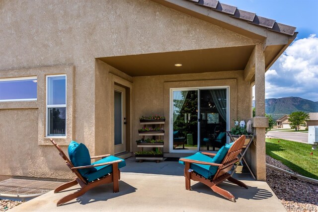 view of patio with a mountain view