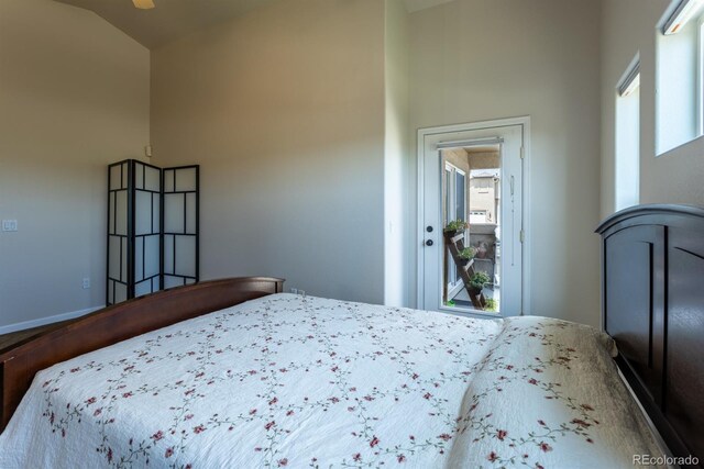 bedroom with lofted ceiling