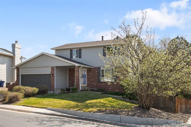 traditional home featuring brick siding and an attached garage