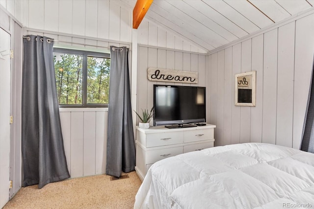 bedroom featuring wood ceiling, light carpet, wooden walls, and vaulted ceiling with beams