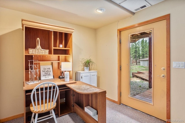 office area with carpet, visible vents, and baseboards