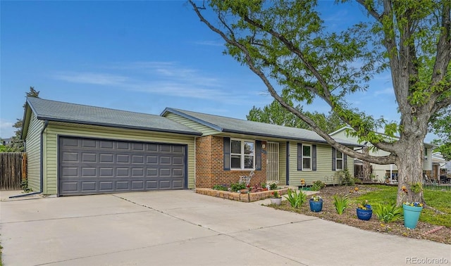 5925 W 86th Ave, Arvada, CO 80003 - ranch-style house with a garage, concrete driveway, and brick siding