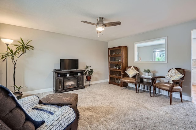 5925 W 86th Ave, Arvada, CO 80003 - carpeted living room featuring ceiling fan and a glass covered fireplace
