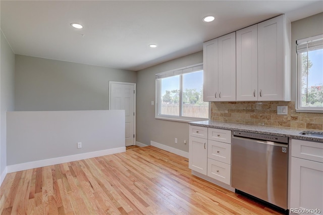 5925 W 86th Ave, Arvada, CO 80003 - kitchen featuring stainless steel dishwasher, light wood-style floors, backsplash, light countertops, and recessed lighting