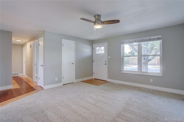 5925 W 86th Ave, Arvada, CO 80003 - carpeted entryway with ceiling fan and baseboards