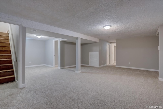 5925 W 86th Ave, Arvada, CO 80003 - finished below grade area featuring light colored carpet, stairway, and a textured ceiling