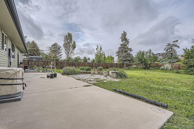 5925 W 86th Ave, Arvada, CO 80003 - fenced backyard featuring a patio area