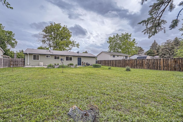 5925 W 86th Ave, Arvada, CO 80003 - back of property featuring a patio and a fenced backyard