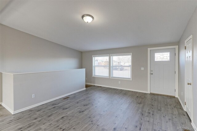 entrance foyer with light hardwood / wood-style floors