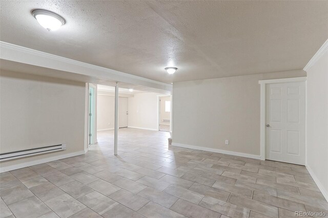 basement featuring a baseboard radiator, a textured ceiling, and ornamental molding