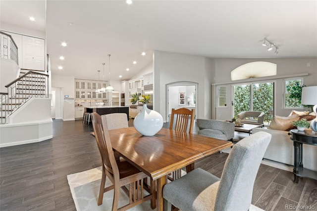 5980 Dunraven Ct, Golden, CO 80403 - dining area featuring stairs, recessed lighting, dark wood-style flooring, and lofted ceiling