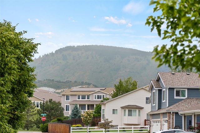 5980 Dunraven Ct, Golden, CO 80403 - mountain view with nearby suburban area