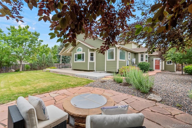 5980 Dunraven Ct, Golden, CO 80403 - rear view of house with a patio area