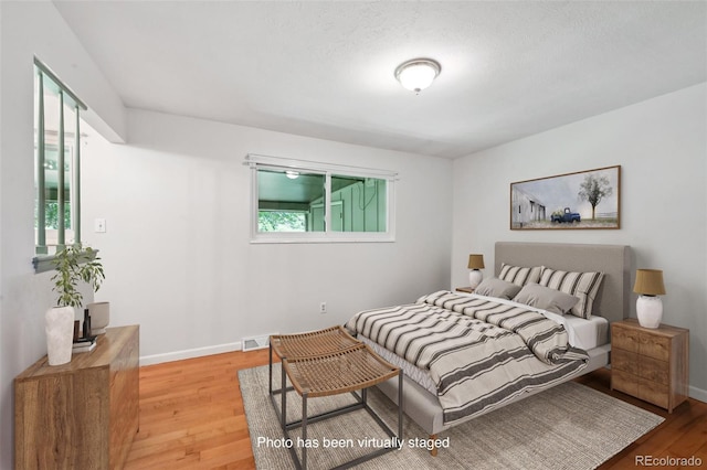 1073 Xenon St, Golden, CO 80401 - bedroom featuring light wood-style floors and baseboards