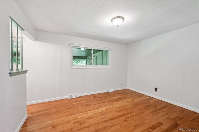 1073 Xenon St, Golden, CO 80401 - spare room with light wood-type flooring and baseboards