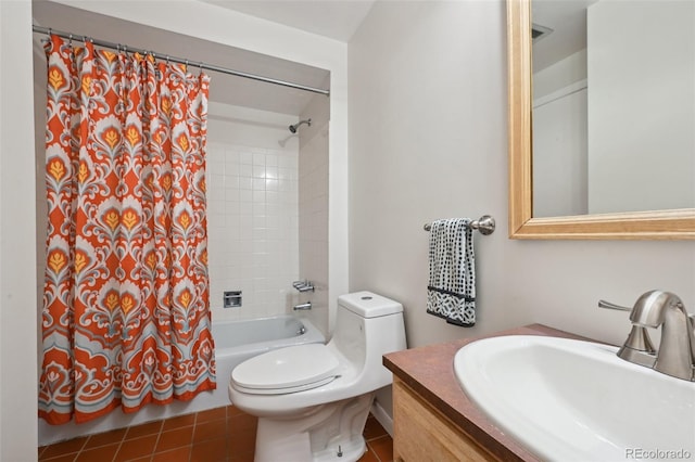 1073 Xenon St, Golden, CO 80401 - bathroom with toilet, shower / tub combo with curtain, tile patterned flooring, and vanity