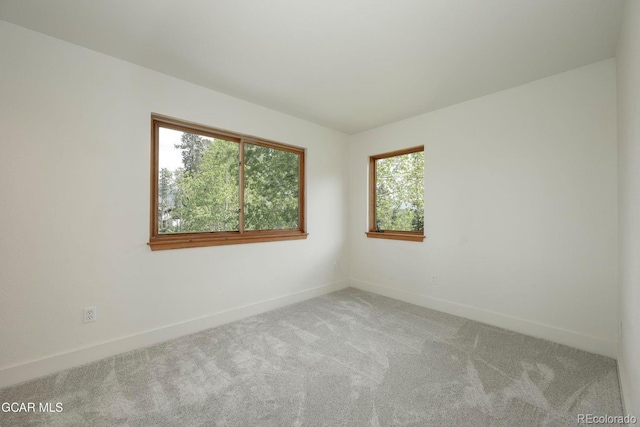 452 Gcr 835, Fraser, CO 80442 - carpeted empty room featuring baseboards