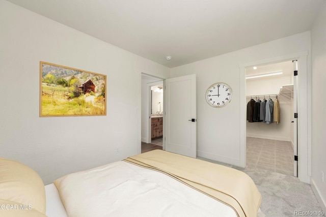 452 Gcr 835, Fraser, CO 80442 - carpeted bedroom featuring a walk in closet and baseboards